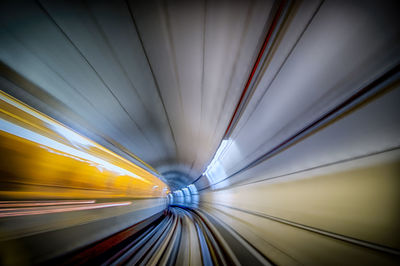 Blurred motion of railroad tracks in tunnel