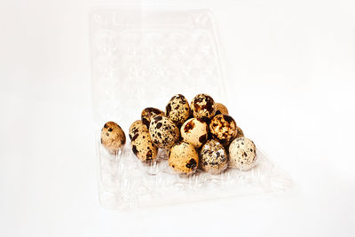 High angle view of cookies against white background