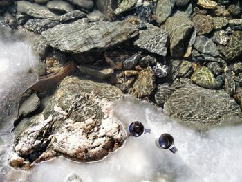 High angle view of steel mug on frozen zanskar river