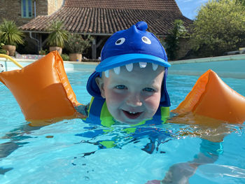 Portrait of boy in swimming pool