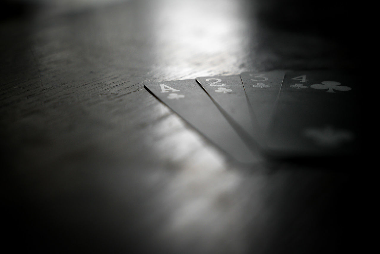 CLOSE-UP OF SIGN ON TABLE