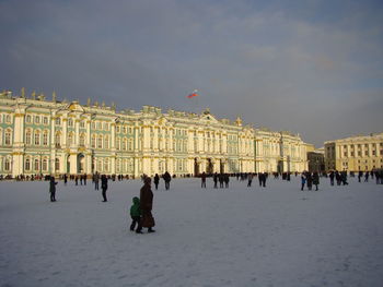 Group of people in front of building in winter