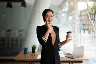 Young woman using mobile phone