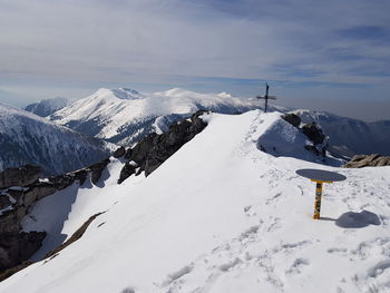 Snow covered mountain against sky
