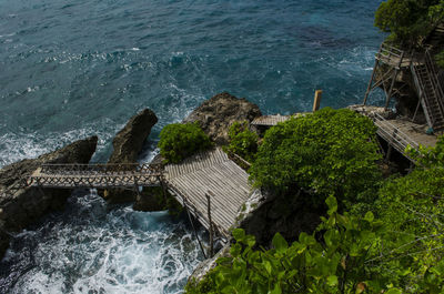 High angle view of rocks in sea