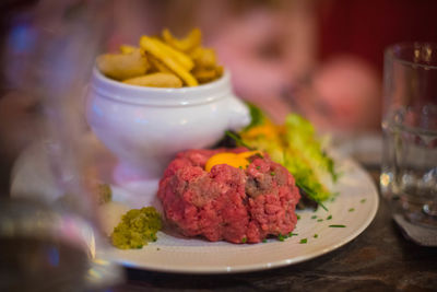 Close-up of food served in plate on table