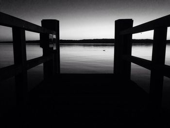 Pier over sea against sky