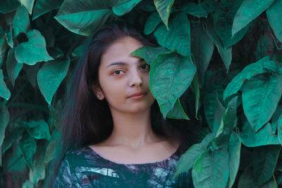 Portrait of a beautiful young woman outdoors