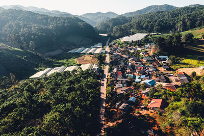 High angle view of townscape and mountains