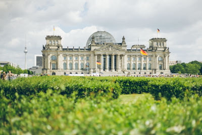 View of historic building against cloudy sky