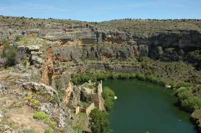 Scenic view of rock formations against sky