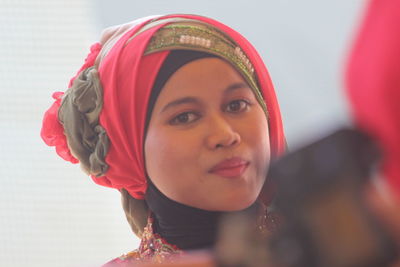 Close-up portrait of a young woman