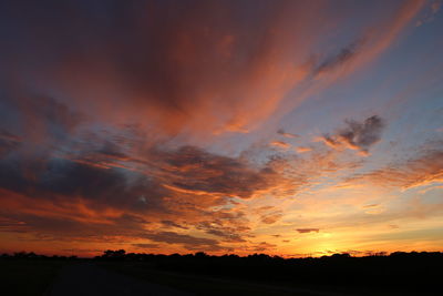 Scenic view of dramatic sky during sunset