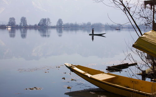 Panoramic view of boats moored in lake