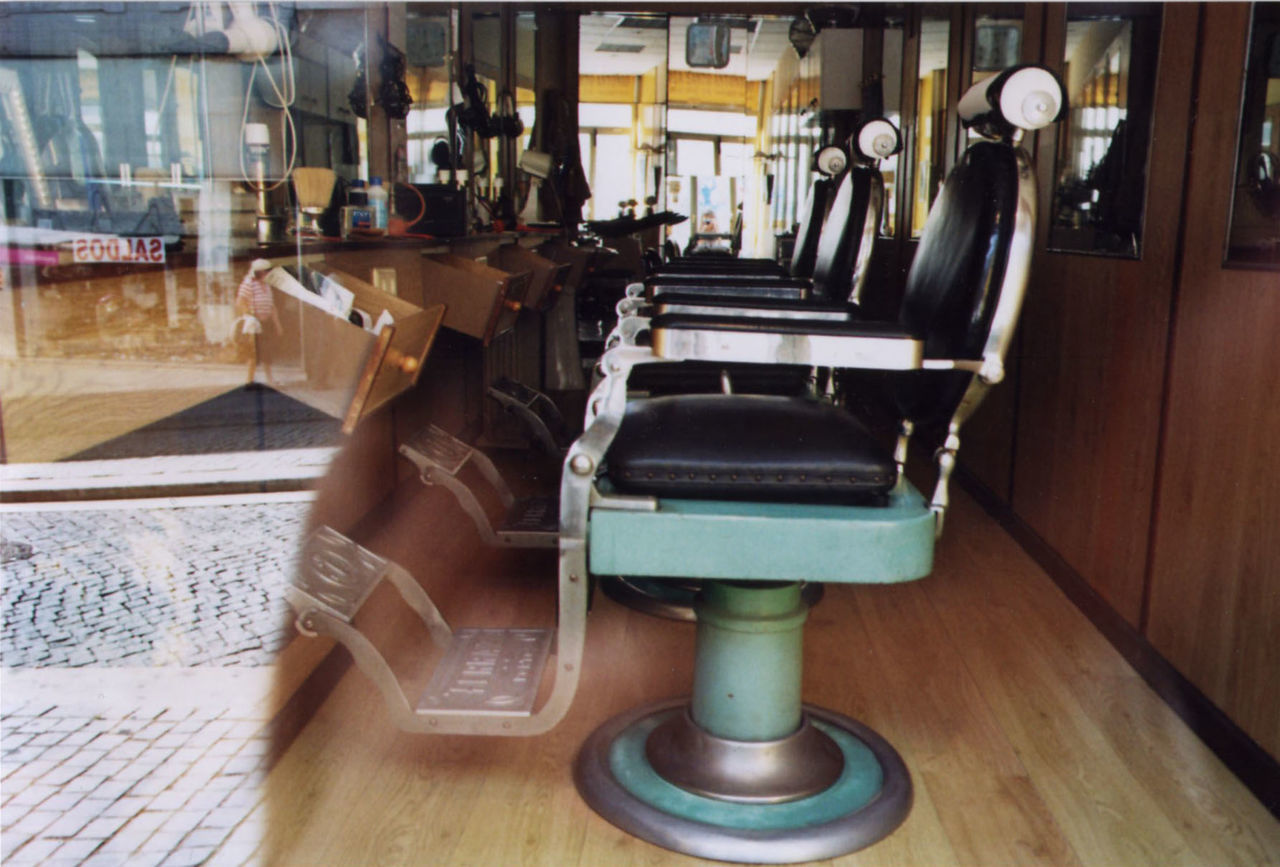 indoors, flooring, table, chair, tiled floor, home interior, high angle view, technology, reflection, low section, hardwood floor, sitting, domestic room, lifestyles, metal, floor, seat, absence