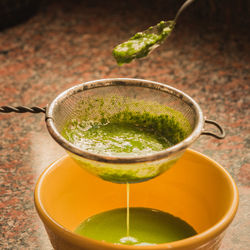 High angle view of tea in glass on table