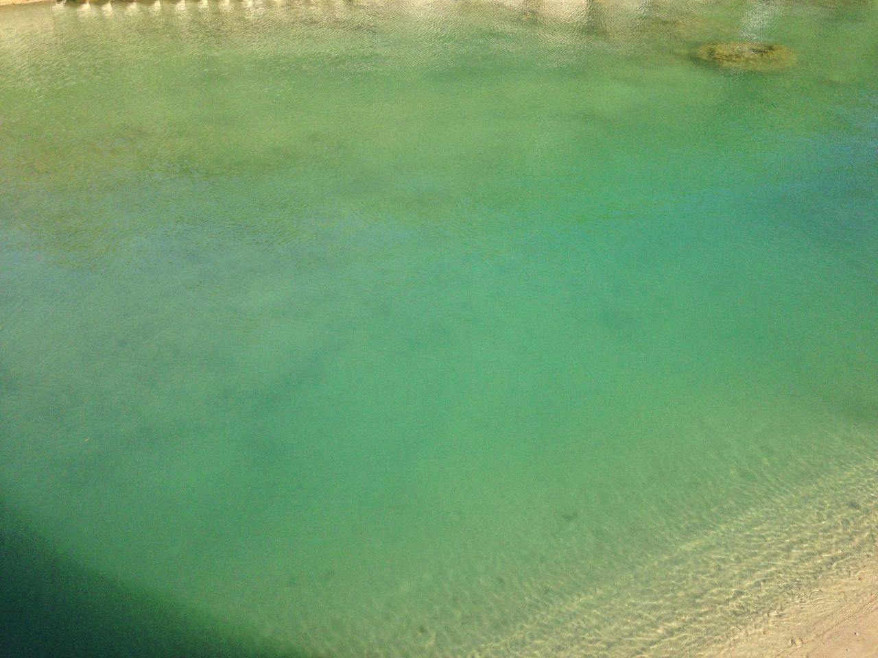 water, tranquility, high angle view, waterfront, nature, tranquil scene, beauty in nature, sea, sand, beach, scenics, rippled, lake, outdoors, day, idyllic, reflection, shore, no people, river