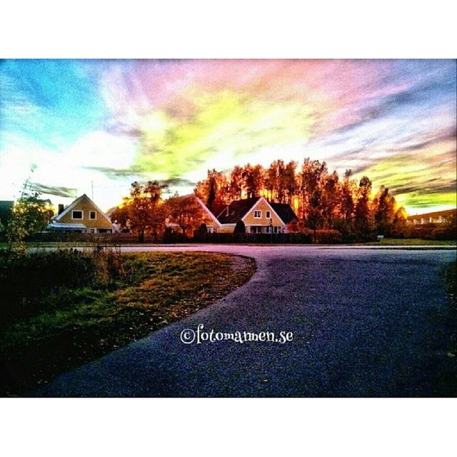 transfer print, building exterior, architecture, built structure, sky, auto post production filter, house, cloud - sky, tree, road, cloud, field, outdoors, sunset, no people, residential structure, grass, nature, the way forward, day