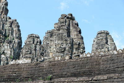 Low angle view of old temple against sky