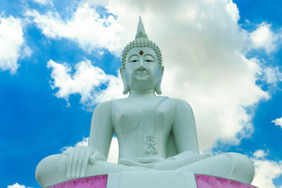 Low angle view of statue against sky