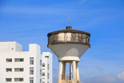 Low angle view of water tower against sky