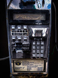 Close-up of old telephone booth