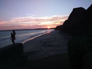 Scenic view of sea at sunset