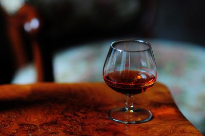 Close-up of wineglass on table