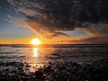 Scenic view of sunset over sea