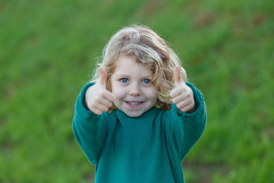 Portrait of cute girl standing outdoors