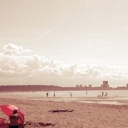 People enjoying at beach