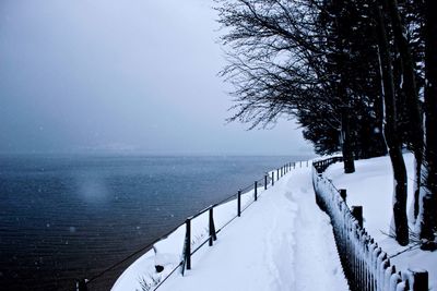 Scenic view of snow covered shore