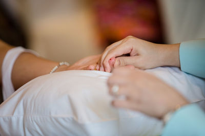 Close-up of couple hands