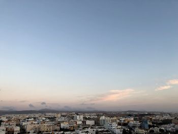 High angle view of townscape against sky during sunset