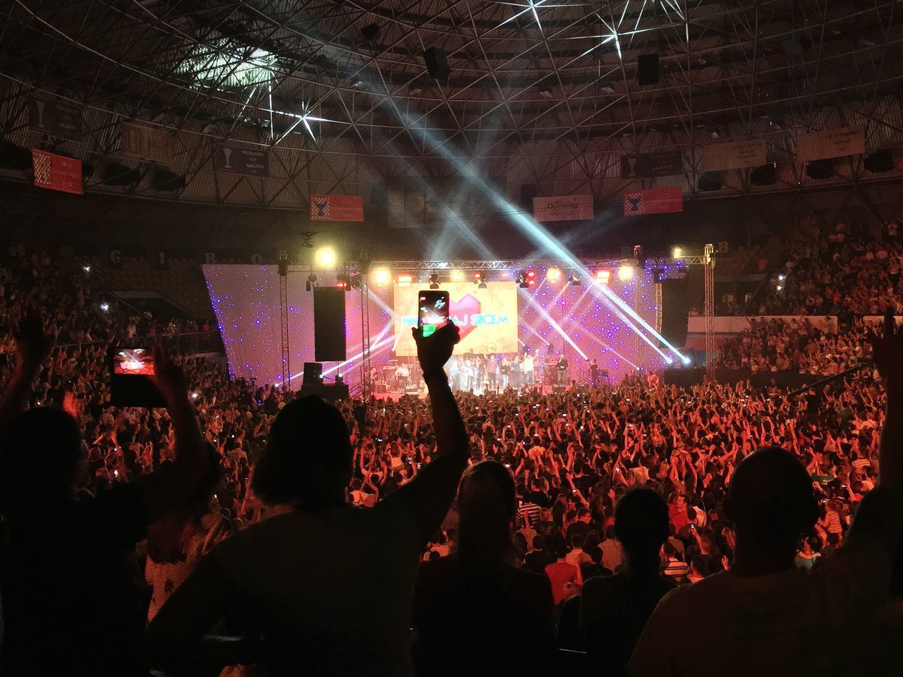 PEOPLE ENJOYING MUSIC CONCERT