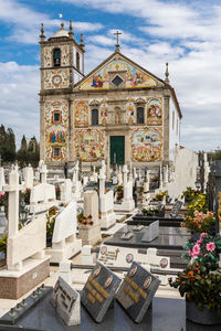 Church and cemetery view against the sky