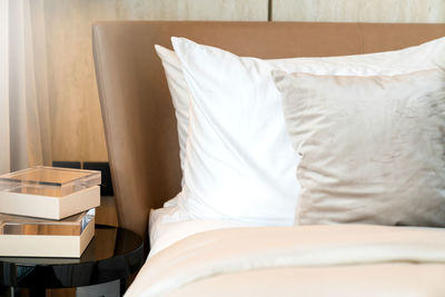 Close-up of white blanket on bed at home