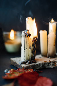 Close-up of burning candle