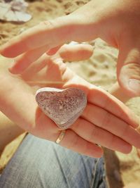 Close-up of hand holding bread