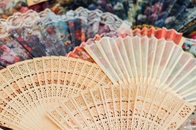 High angle view of hand fans for sale in market