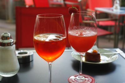 Close-up of red wine in glass on table