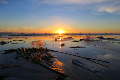 Scenic view of sea against sky during sunset