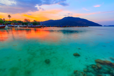 Scenic view of sea against sky during sunset