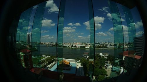 Panoramic view of sea seen through window