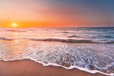 Scenic view of beach during sunset