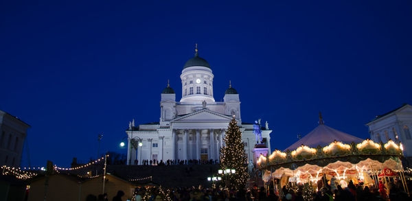 Low angle view of illuminated building at night