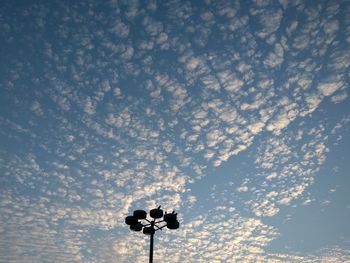 Low angle view of street light against sky