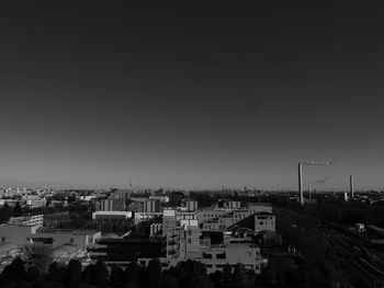 Cityscape against clear sky