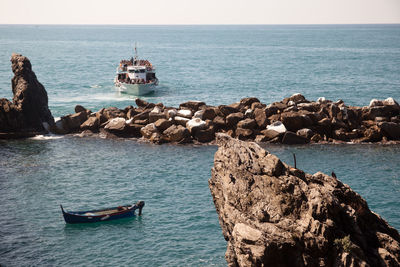 Boat at calm blue sea