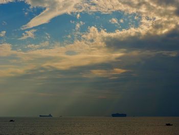 Scenic view of sea against sky at sunset